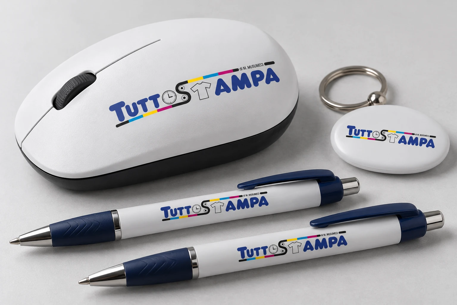 Oggetti promozionali con logo Tuttostampa stampato in tampografia — esempio illustrativo